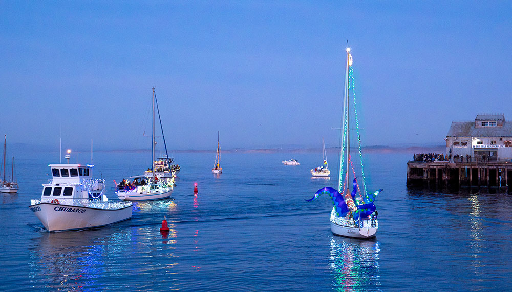 boats lit up for the holidays