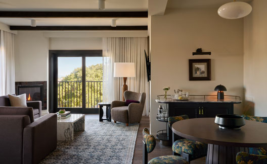 Kimpton Mirador Hotel One Bedroom Suite Bay View Fireplace sitting area and dining table